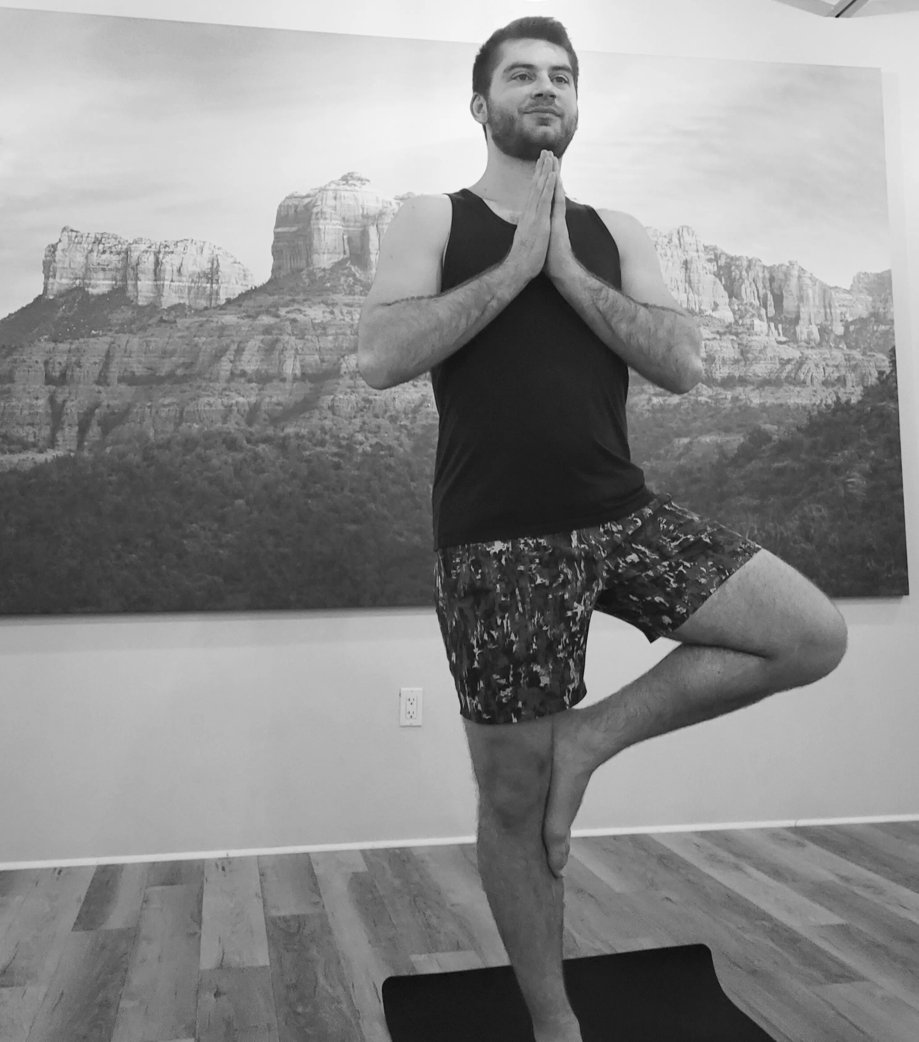 Nicholas Mendez / Nick Mendez black and white photo doing yoga
