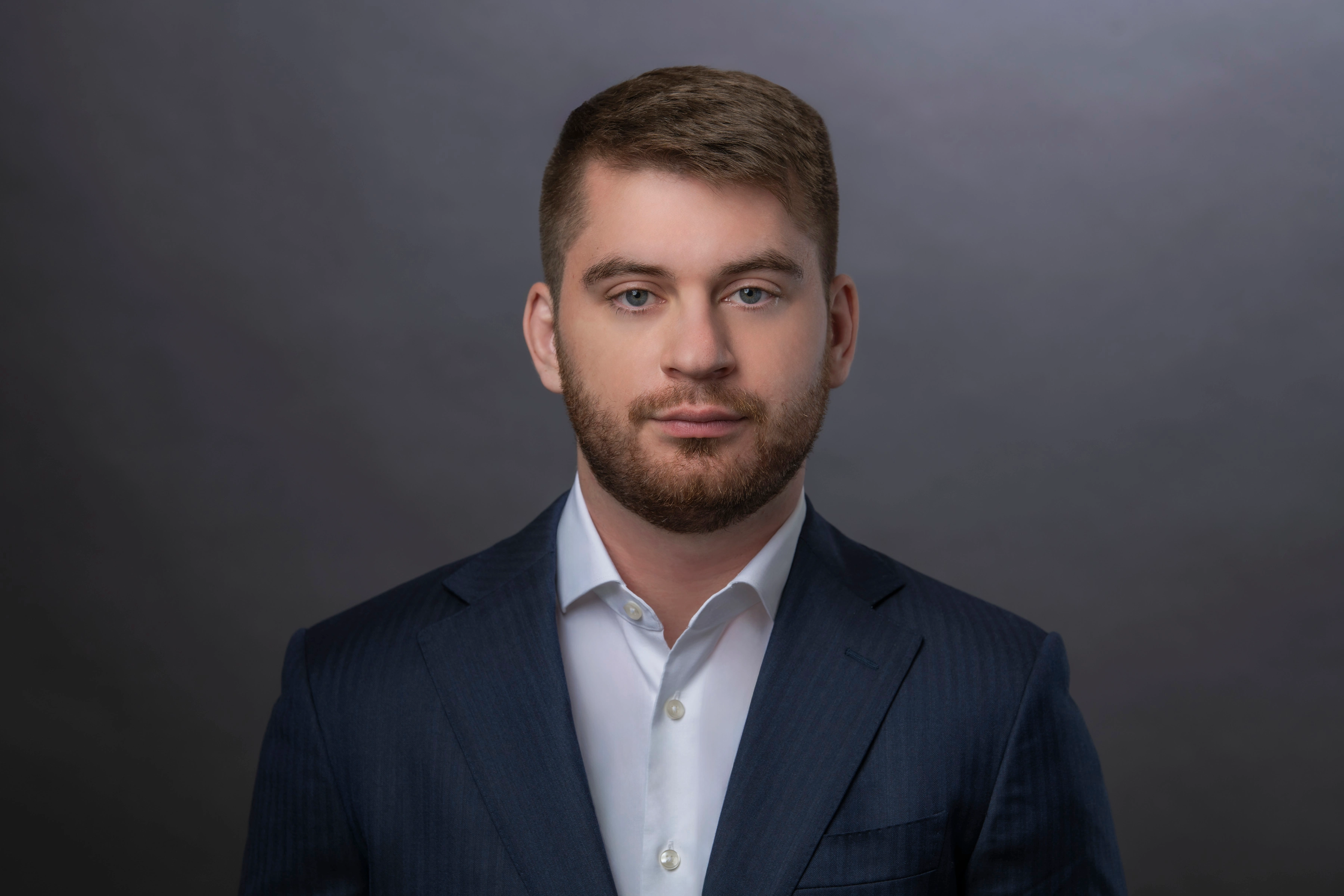 Nicholas Mendez / Nick Mendez image in navy blue suit and white shirt